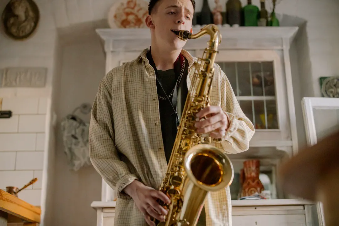 Young man playing the saxophone